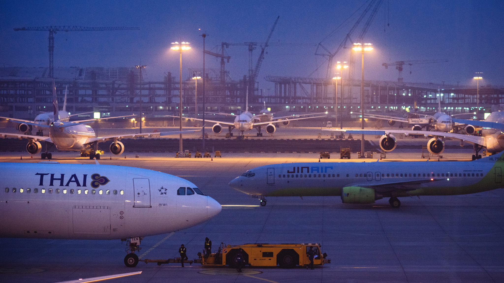 Nikon D810 + AF DC-Nikkor 135mm f/2 sample photo. Airliners move each other in the airport photography