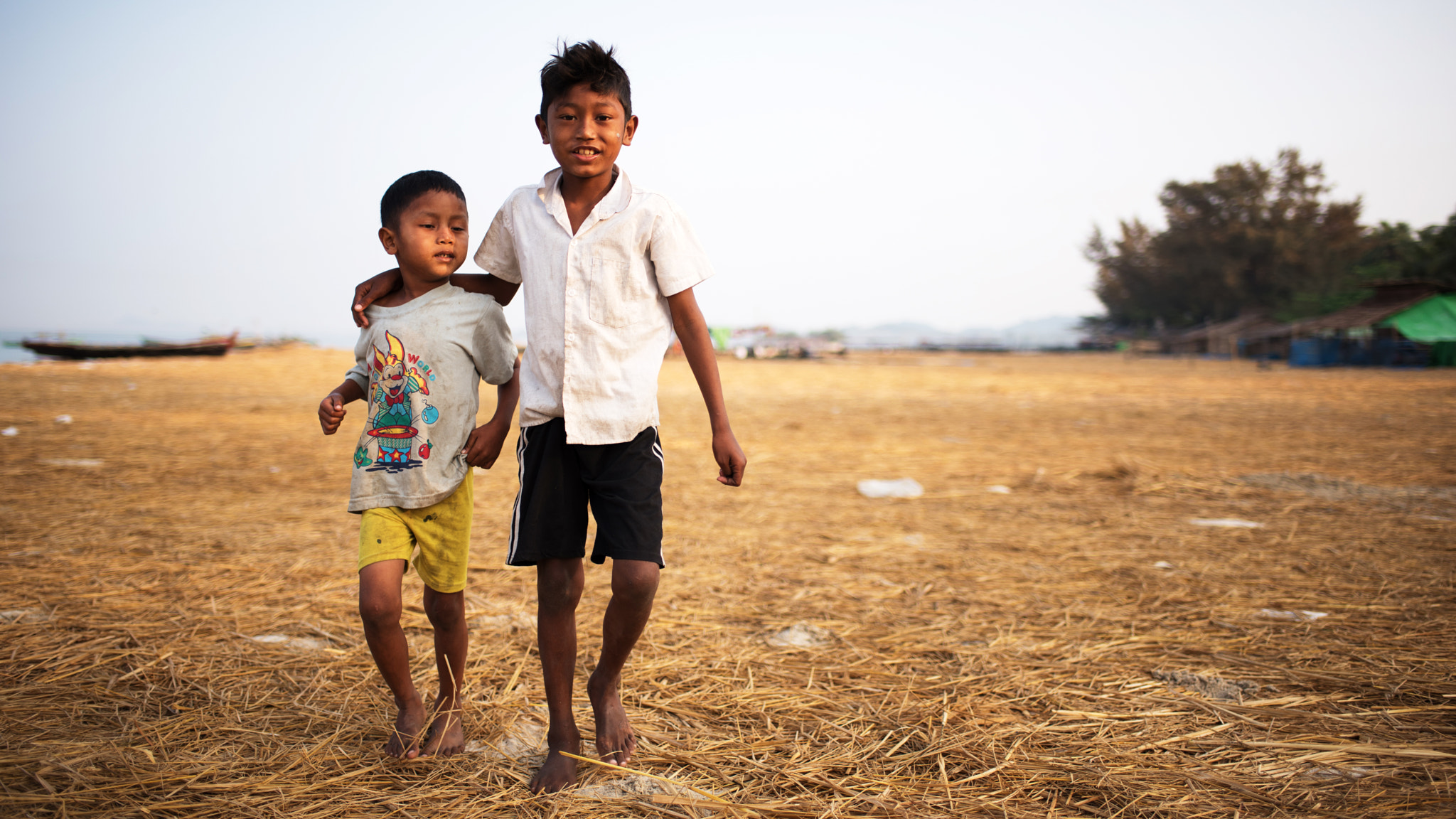 Nikon D750 + AF-S Nikkor 35mm f/1.8G sample photo. Boys on the beach photography