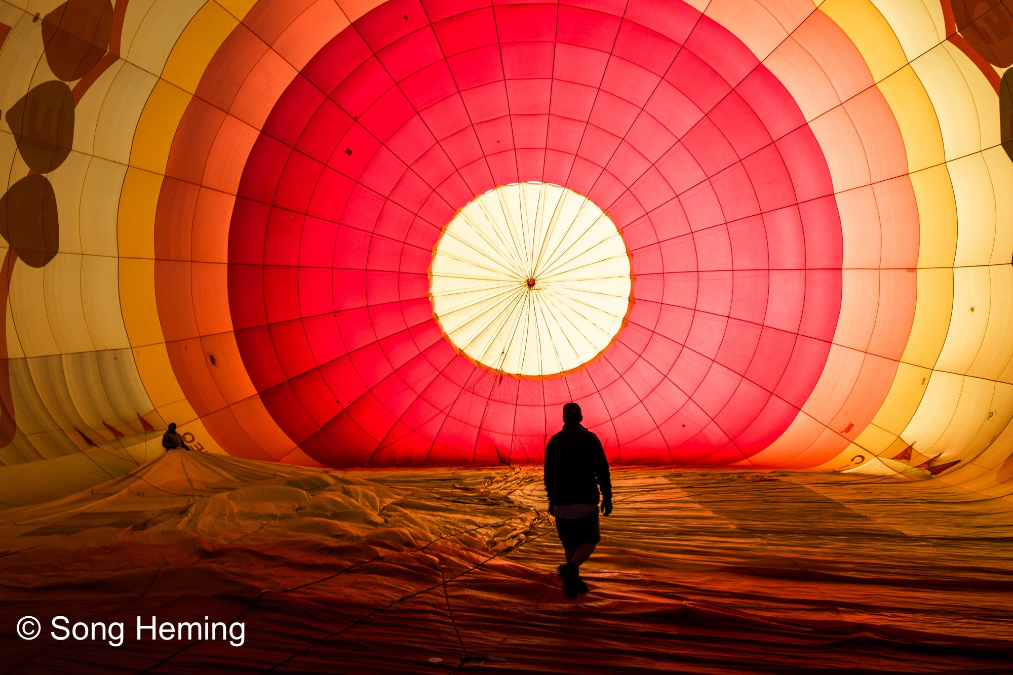 Canon TS-E 24.0mm f/3.5 L II sample photo. A man walk in the balloon in sunrise photography