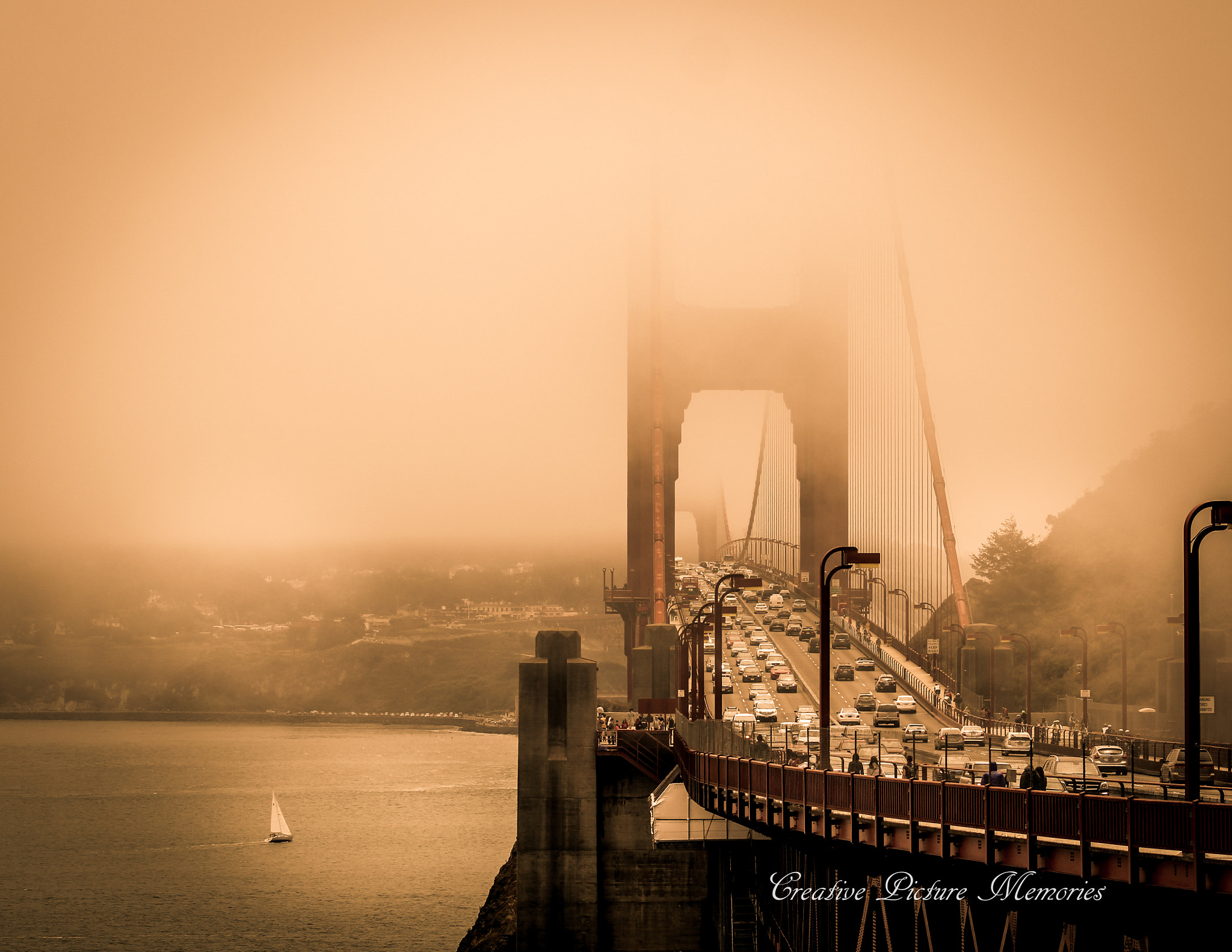 Canon EOS 550D (EOS Rebel T2i / EOS Kiss X4) + Canon EF 70-200mm F4L USM sample photo. Fog over golden gate bridge photography