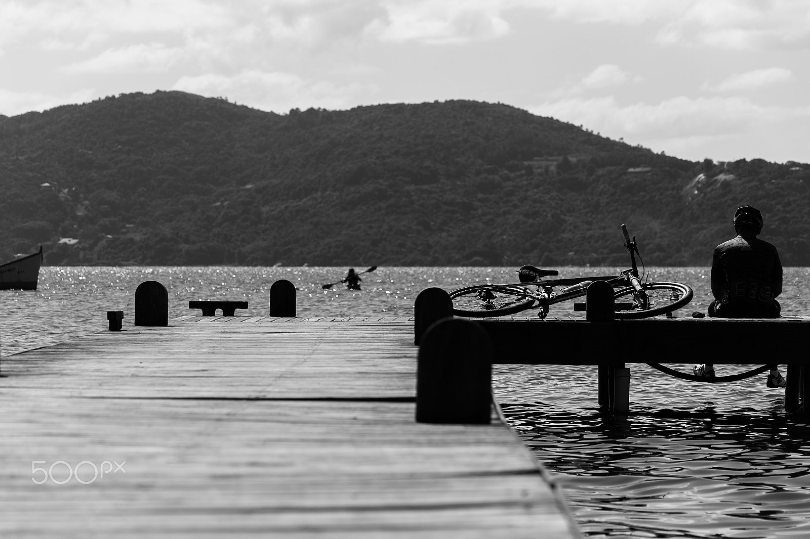 Sigma APO Macro 150mm f/2.8 EX DG HSM sample photo. Man with a bike in the pier photography