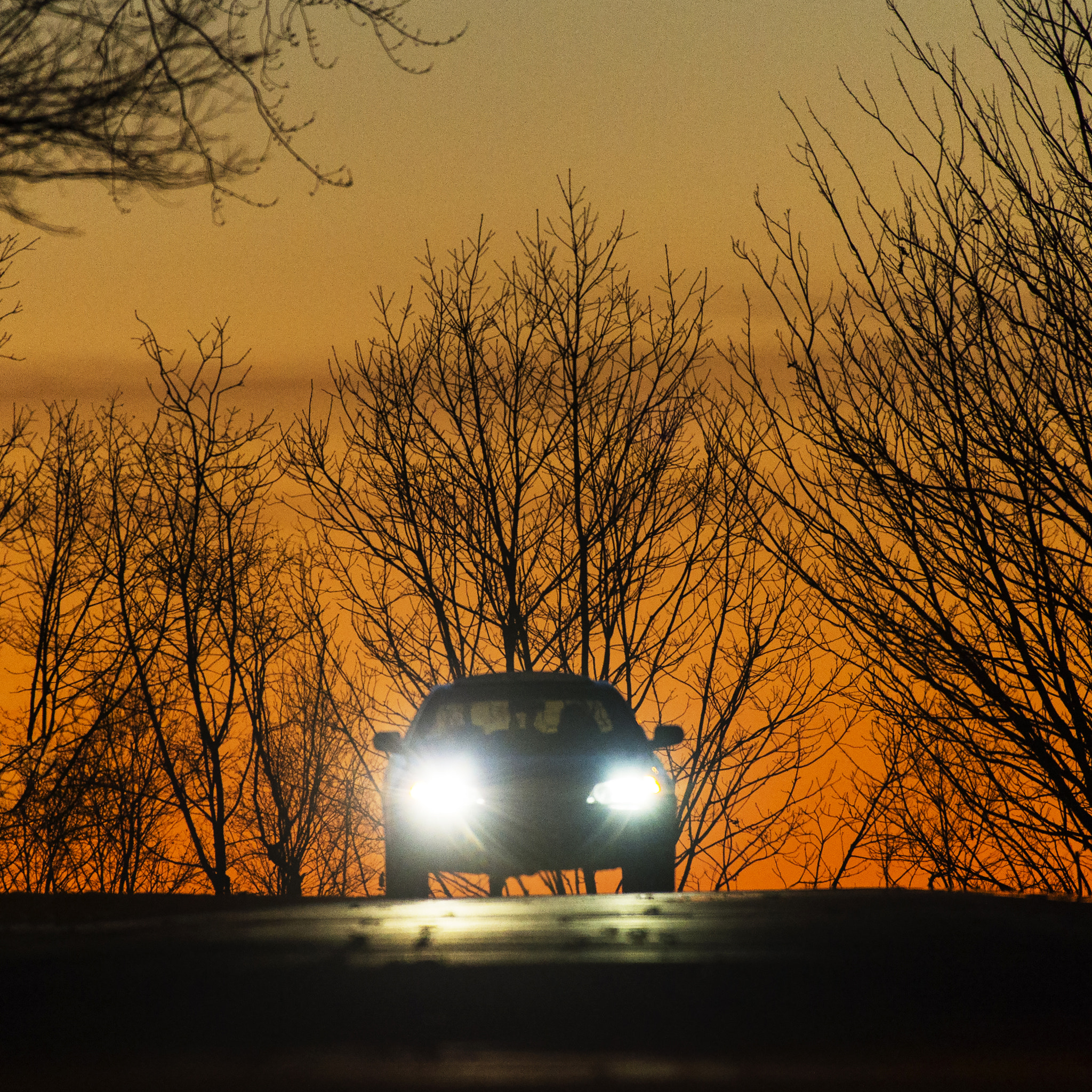 Nikon AF-S Nikkor 200-500mm F5.6E ED VR sample photo. Sunset headlights photography