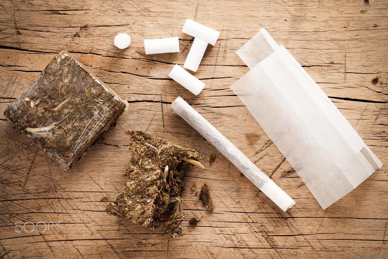 ZEISS Makro-Planar T* 100mm F2 sample photo. Weed marijuana hashish roll wood background photography