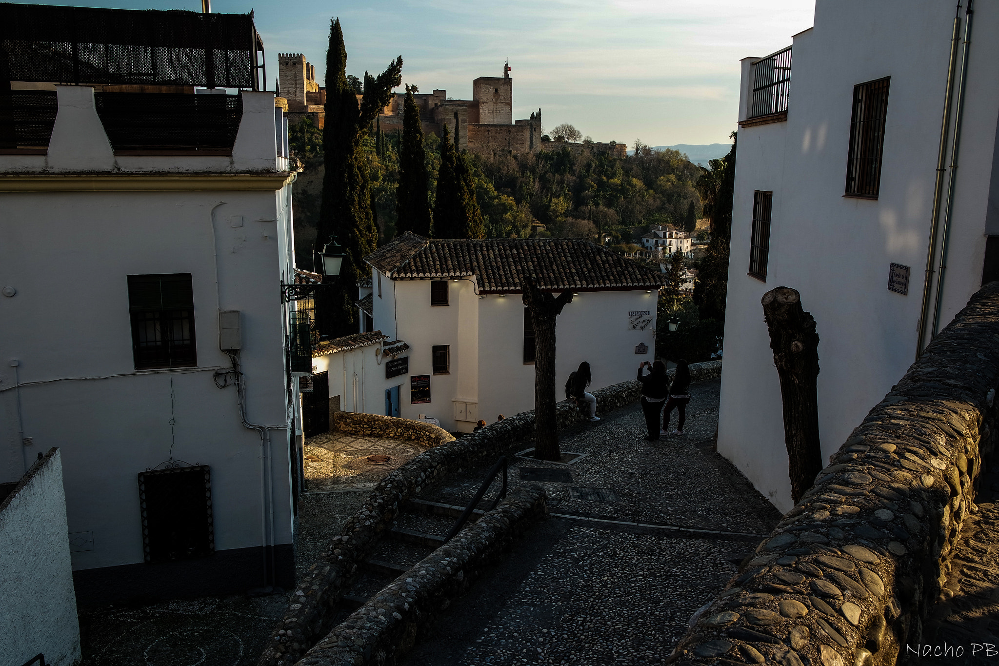 Samsung NX3000 + NX 20-50mm F3.5-5.6 sample photo. White houses with the alhambra at the background photography