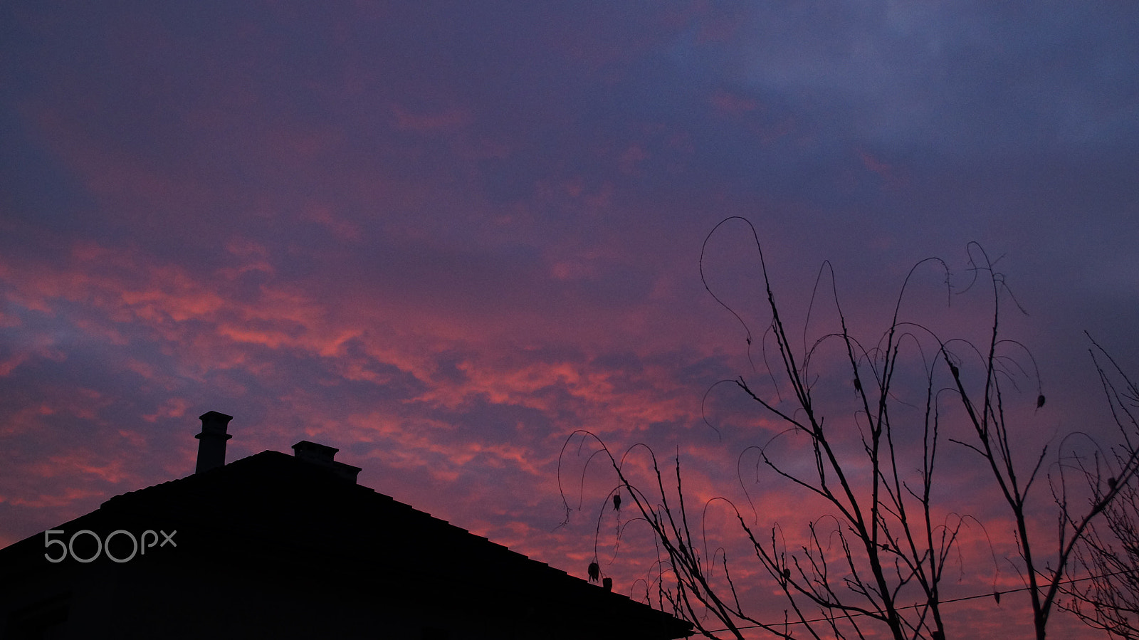 Sony DT 18-200mm F3.5-6.3 sample photo. | sunset roof | photography
