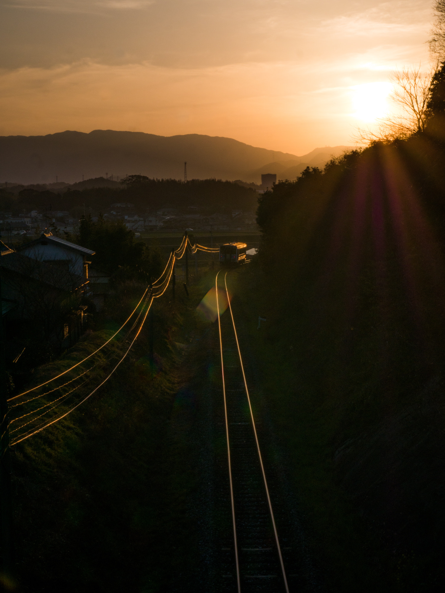 LUMIX G VARIO PZ 14-42/F3.5-5.6 sample photo. Sunset railway photography
