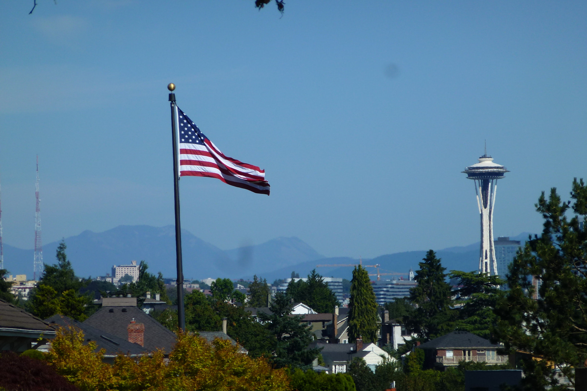 Leica V-Lux 30 / Panasonic Lumix DMC-TZ22 sample photo. Flag next to space needle photography