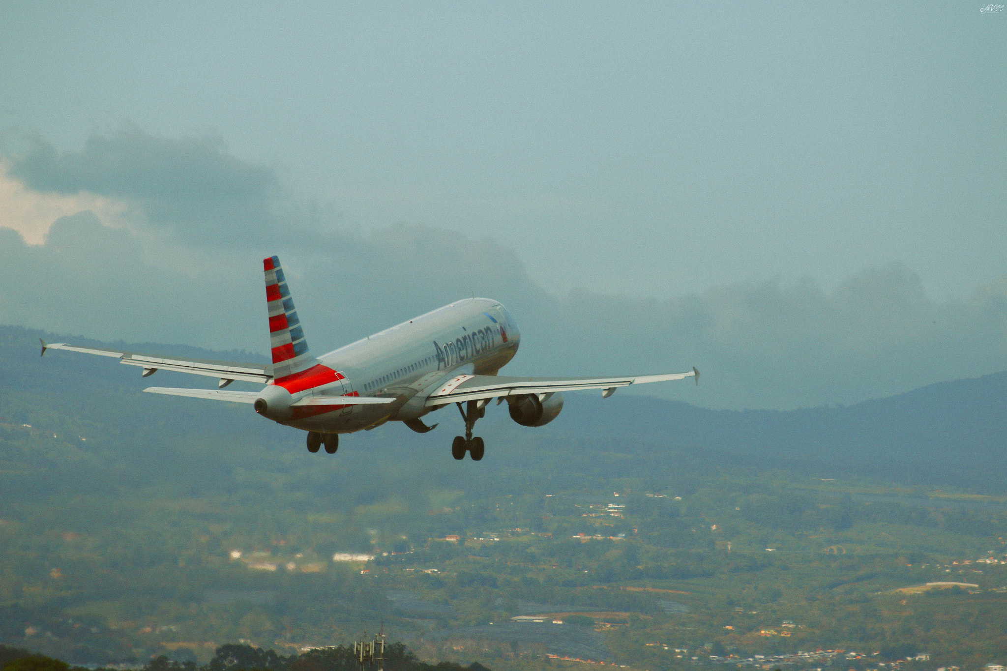 Canon EF 100-300mm F4.5-5.6 USM sample photo. Flying photography