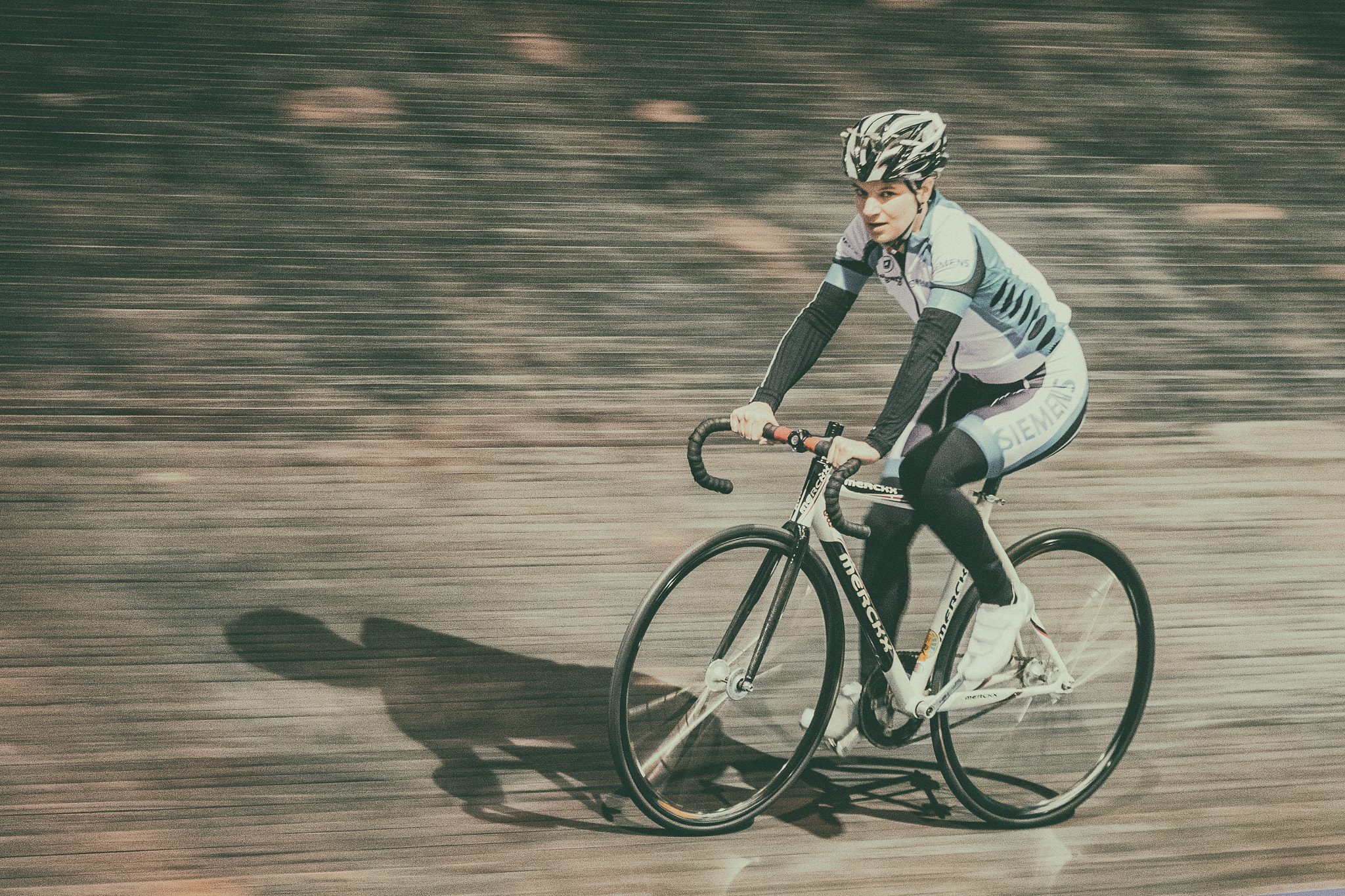 Sigma 70-200mm F2.8 EX DG OS HSM sample photo. Indoor cycling photography