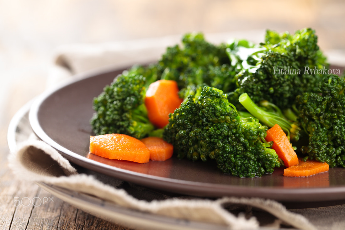 Steamed broccoli on plate.