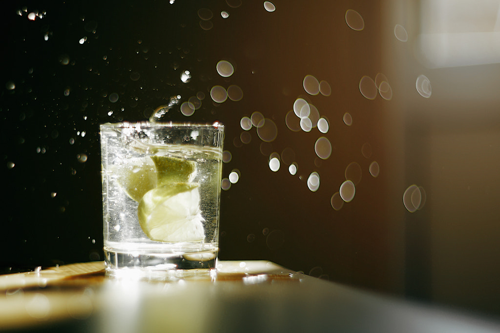 glass of water splashing lime by Art Gurt on 500px.com