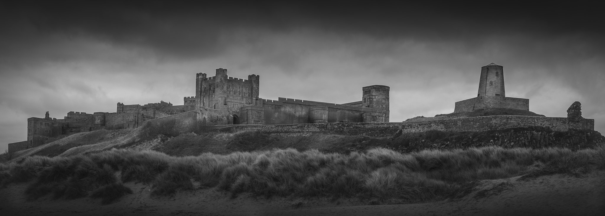 Canon EOS 700D (EOS Rebel T5i / EOS Kiss X7i) + Canon EF 16-35mm F4L IS USM sample photo. By the shores of bamburgh photography