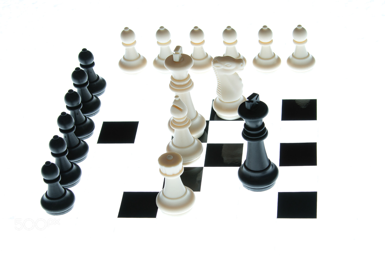 Canon EOS 70D + Canon EF 28-300mm F3.5-5.6L IS USM sample photo. Chess pieces on the board on a white background photography