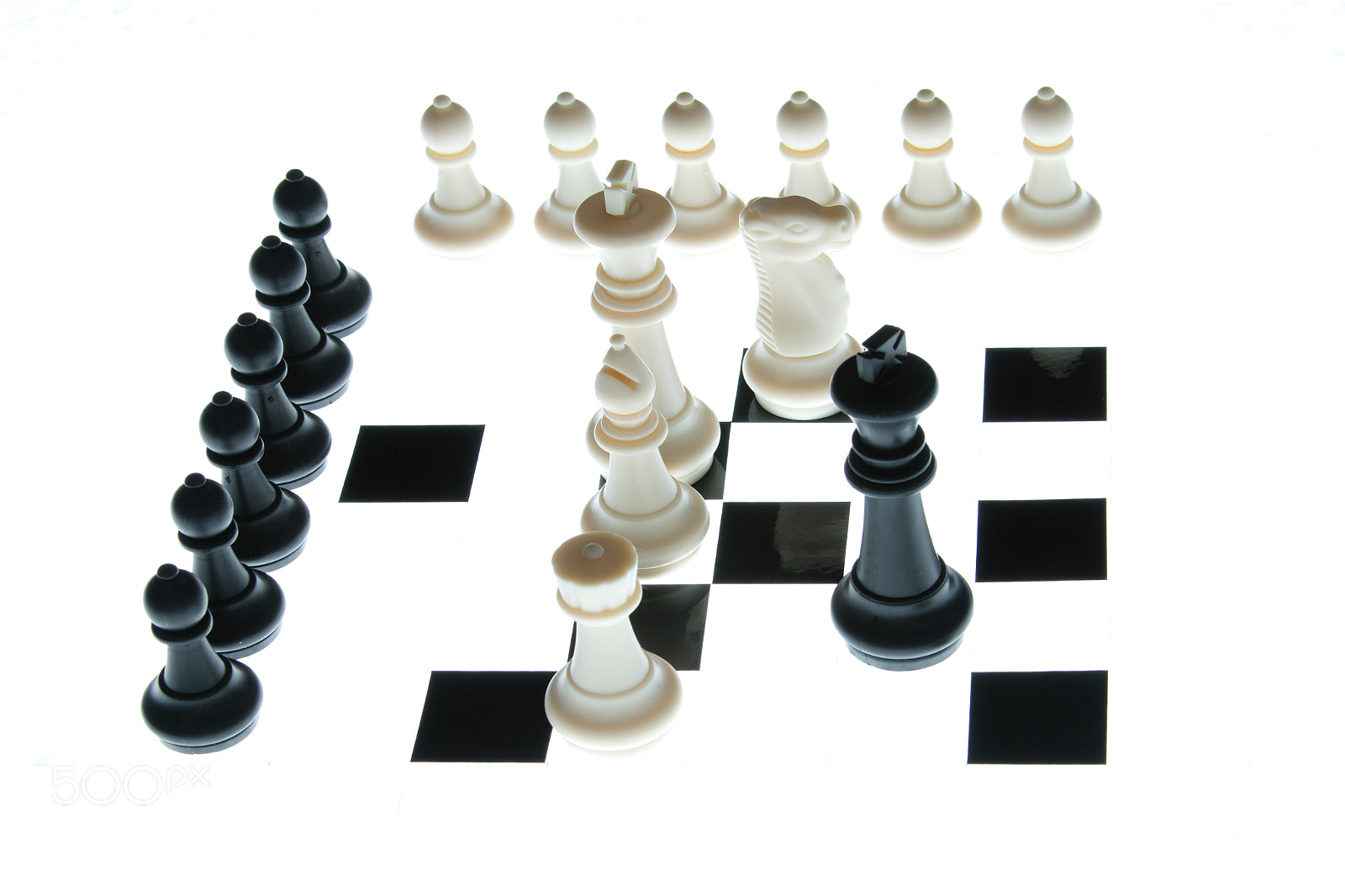 Canon EF 28-300mm F3.5-5.6L IS USM sample photo. Chess pieces on the board on a white background photography