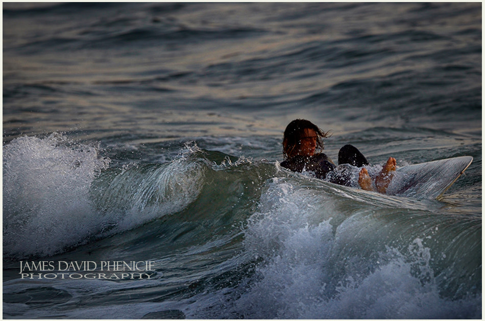 Nikon D7000 + Nikon AF-S Nikkor 500mm F4G ED VR sample photo. Battling waves at sunset photography