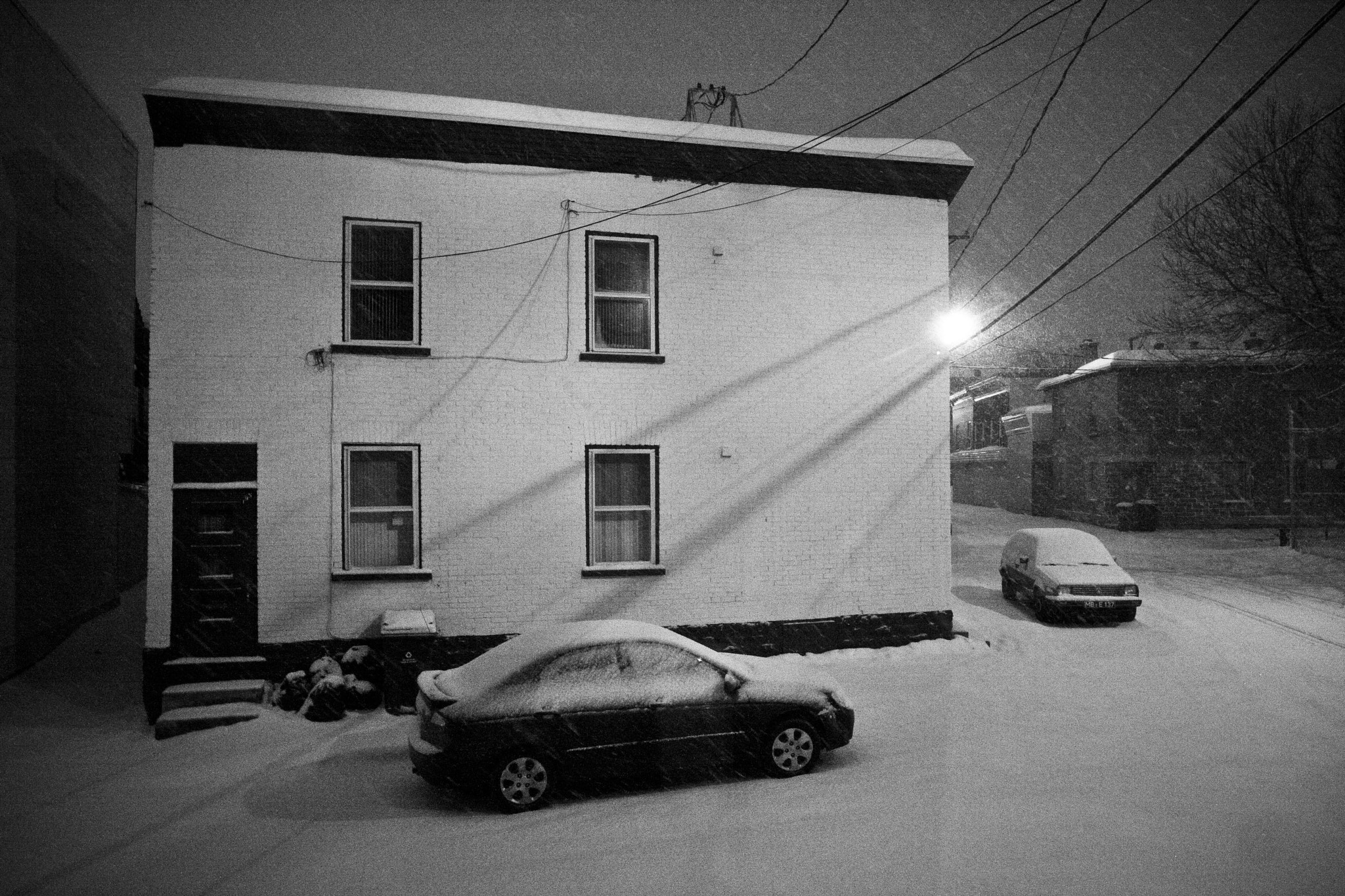 Canon EOS 40D + Sigma 15-30mm f/3.5-4.5 EX DG Aspherical sample photo. Snowstorm on st-ambroise street photography