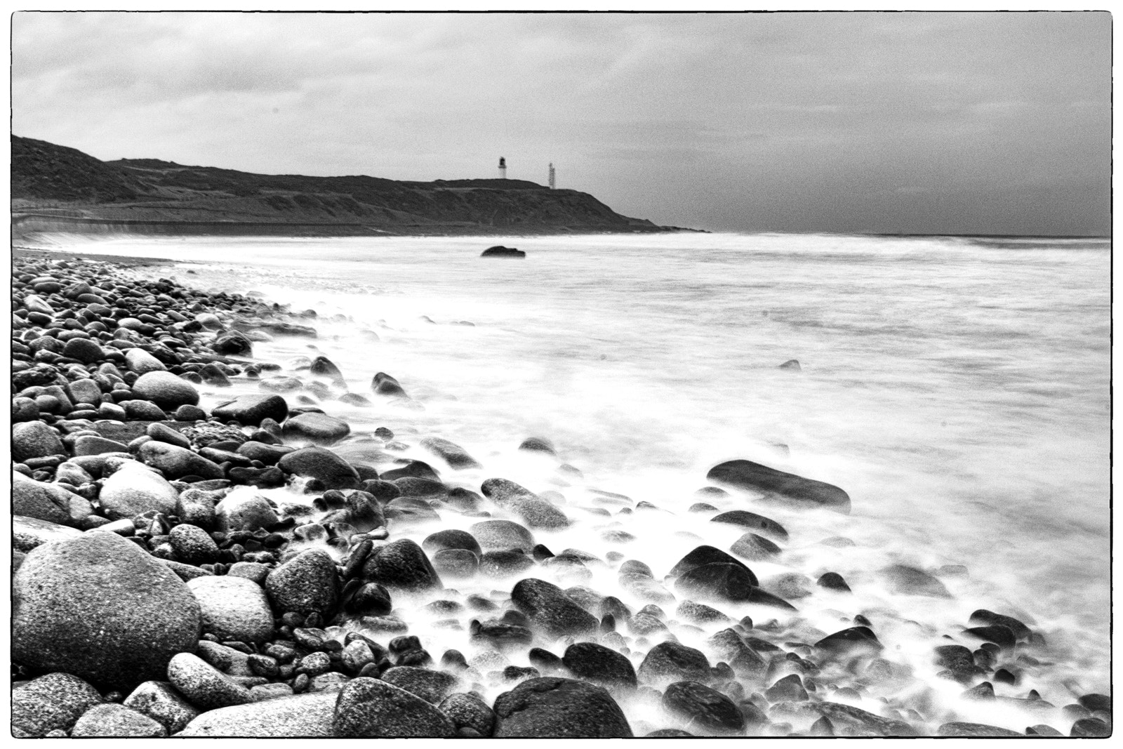 Sony a7 II + Canon EF 20mm F2.8 USM sample photo. - greyhope bay,  blur on rocks - photography