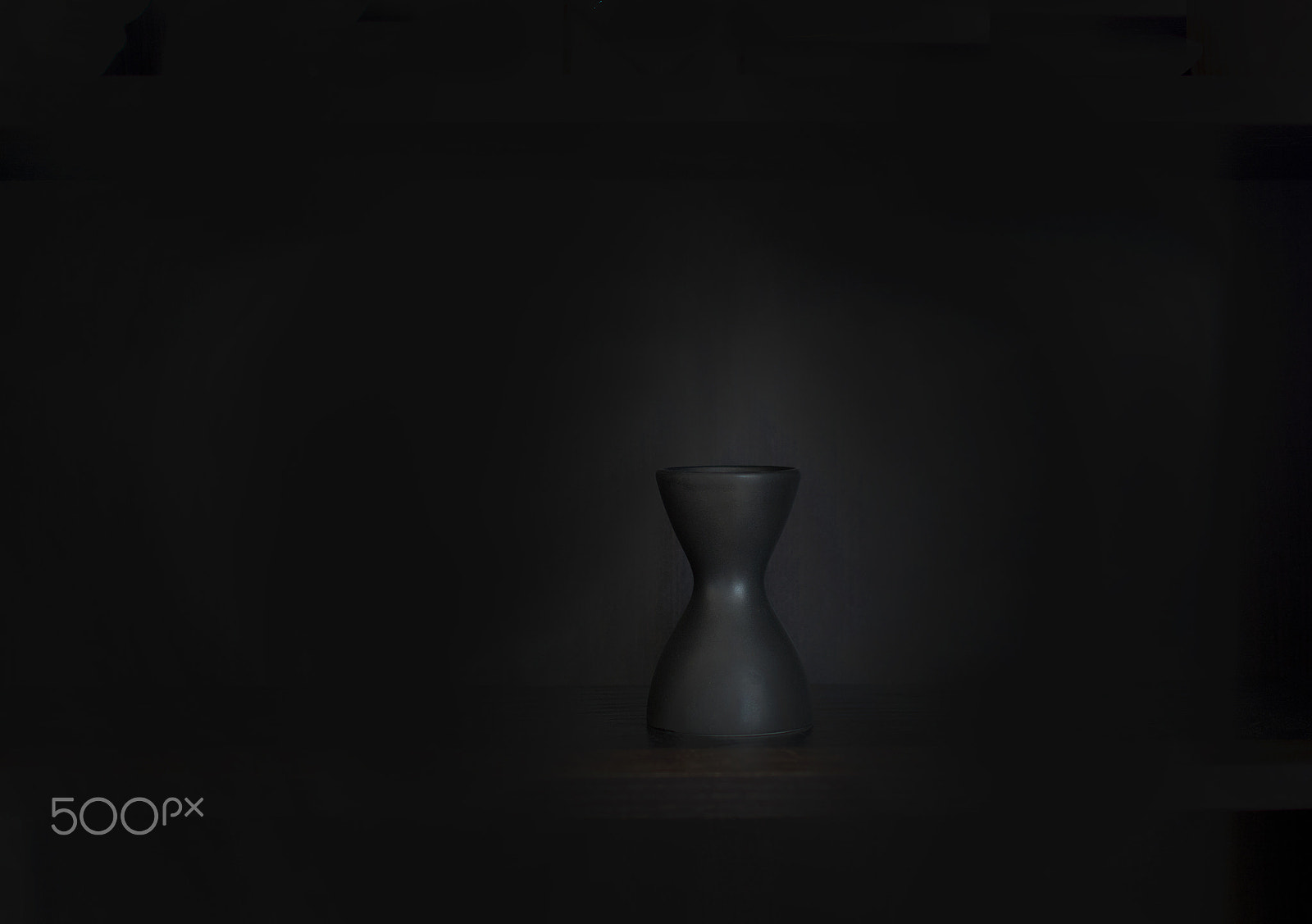 IX-Nikkor 24-70mm f/3.5-5.6 sample photo. Black vase photography