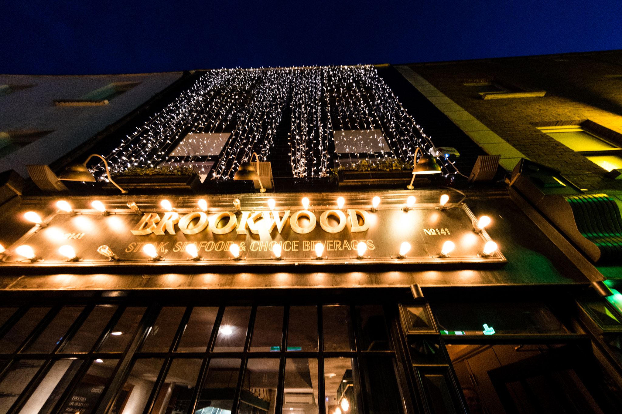 Nikon AF DX Fisheye-Nikkor 10.5mm F2.8G ED sample photo. Dinner out photography