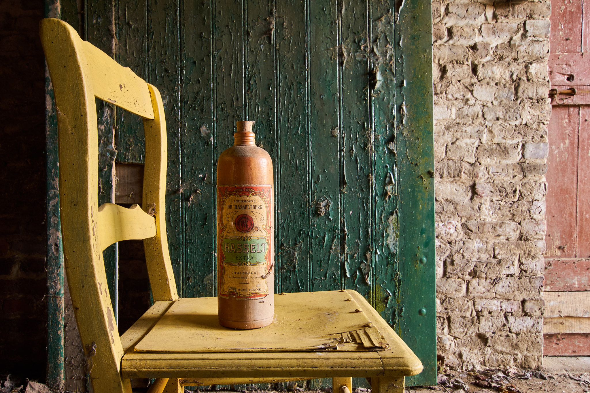 Sony ILCA-77M2 + 10-20mm F3.5 sample photo. Old bottle on chair photography