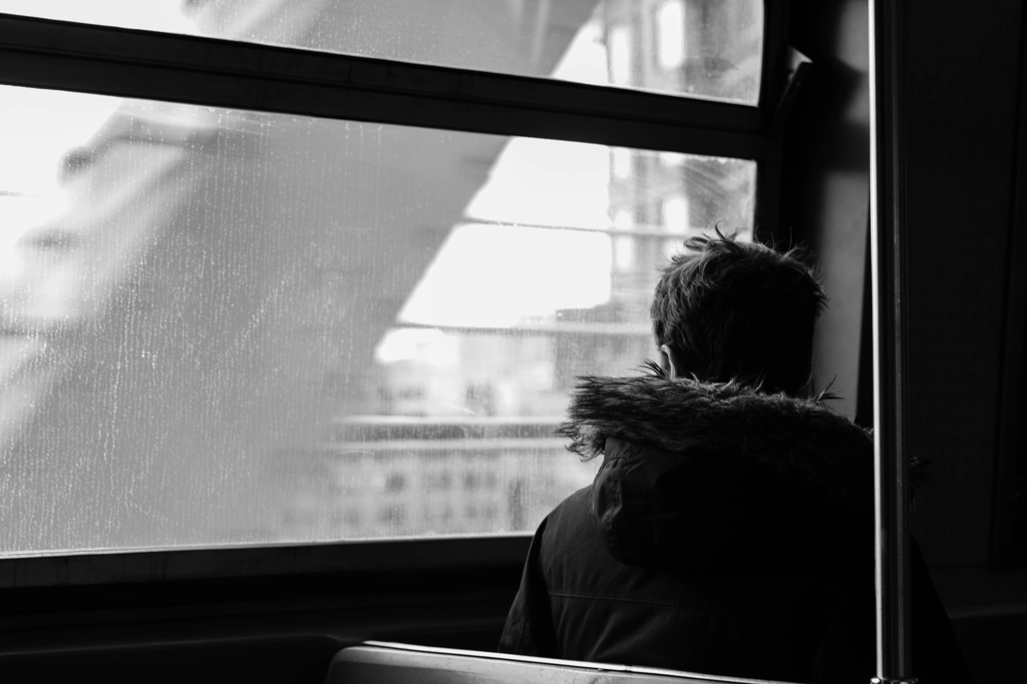 Sigma 50mm F1.4 EX DG HSM sample photo. Looking out the subway window photography