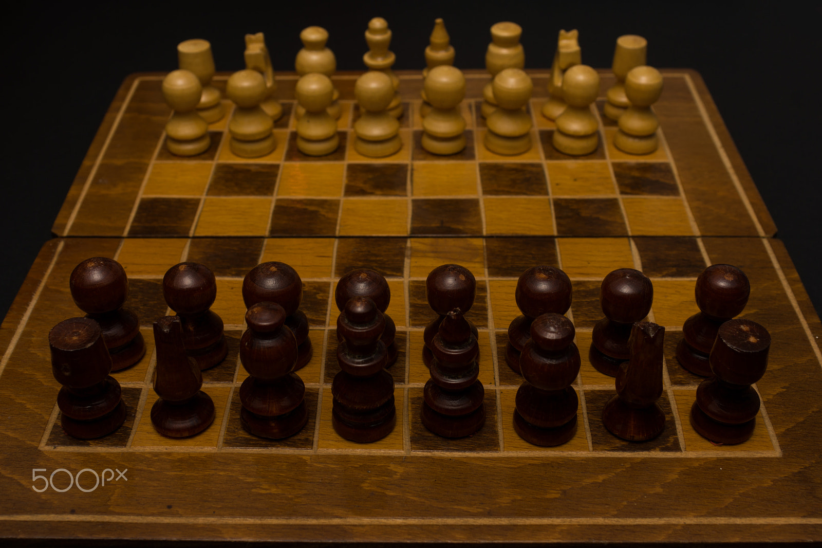 Sony SLT-A77 + Minolta AF 28-85mm F3.5-4.5 sample photo. Light and dark wooden chess pieces on chess table. photography