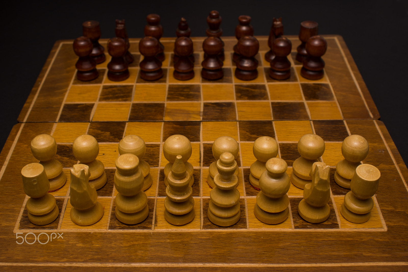 Sony SLT-A77 + Minolta AF 28-85mm F3.5-4.5 sample photo. Light and dark wooden chess pieces on chess table. photography
