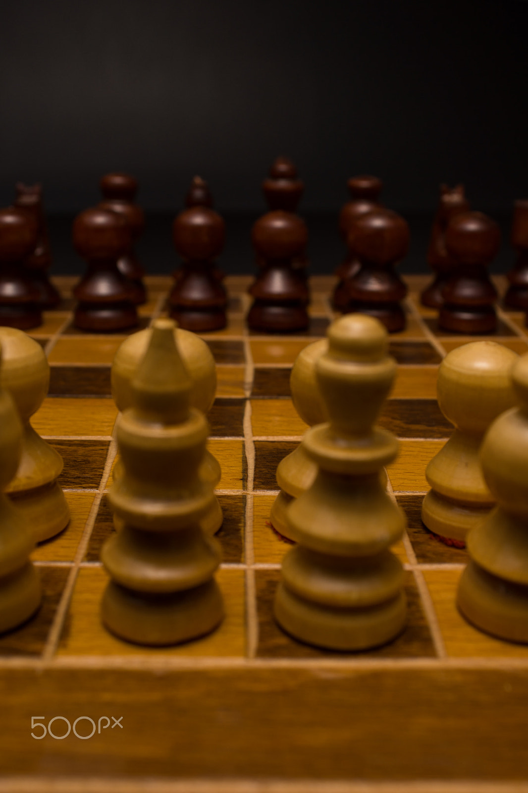 Sony SLT-A77 + Minolta AF 28-85mm F3.5-4.5 sample photo. Light and dark wooden chess pieces on chess table. photography