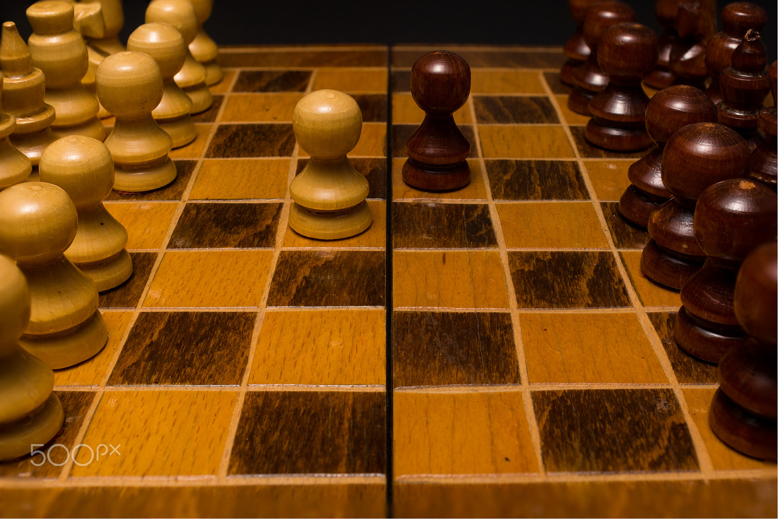 Sony SLT-A77 + Minolta AF 28-85mm F3.5-4.5 sample photo. Light and dark wooden chess pieces on chess table. photography