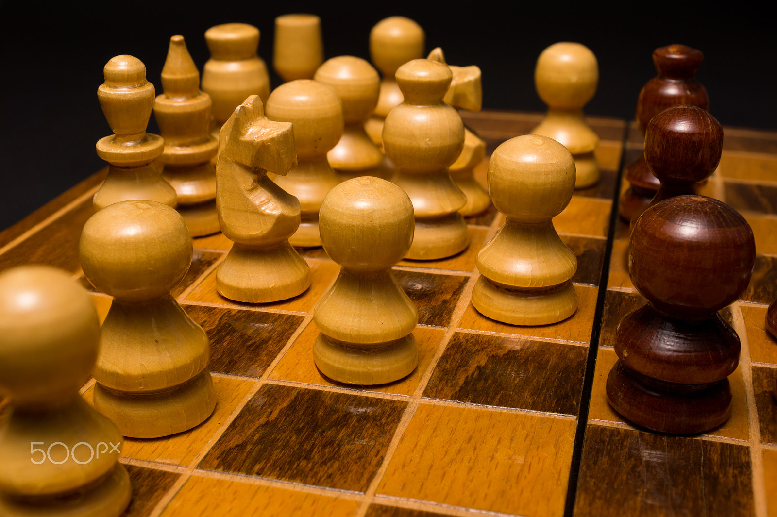 Sony SLT-A77 + Minolta AF 28-85mm F3.5-4.5 sample photo. Light and dark wooden chess pieces on chess table. photography