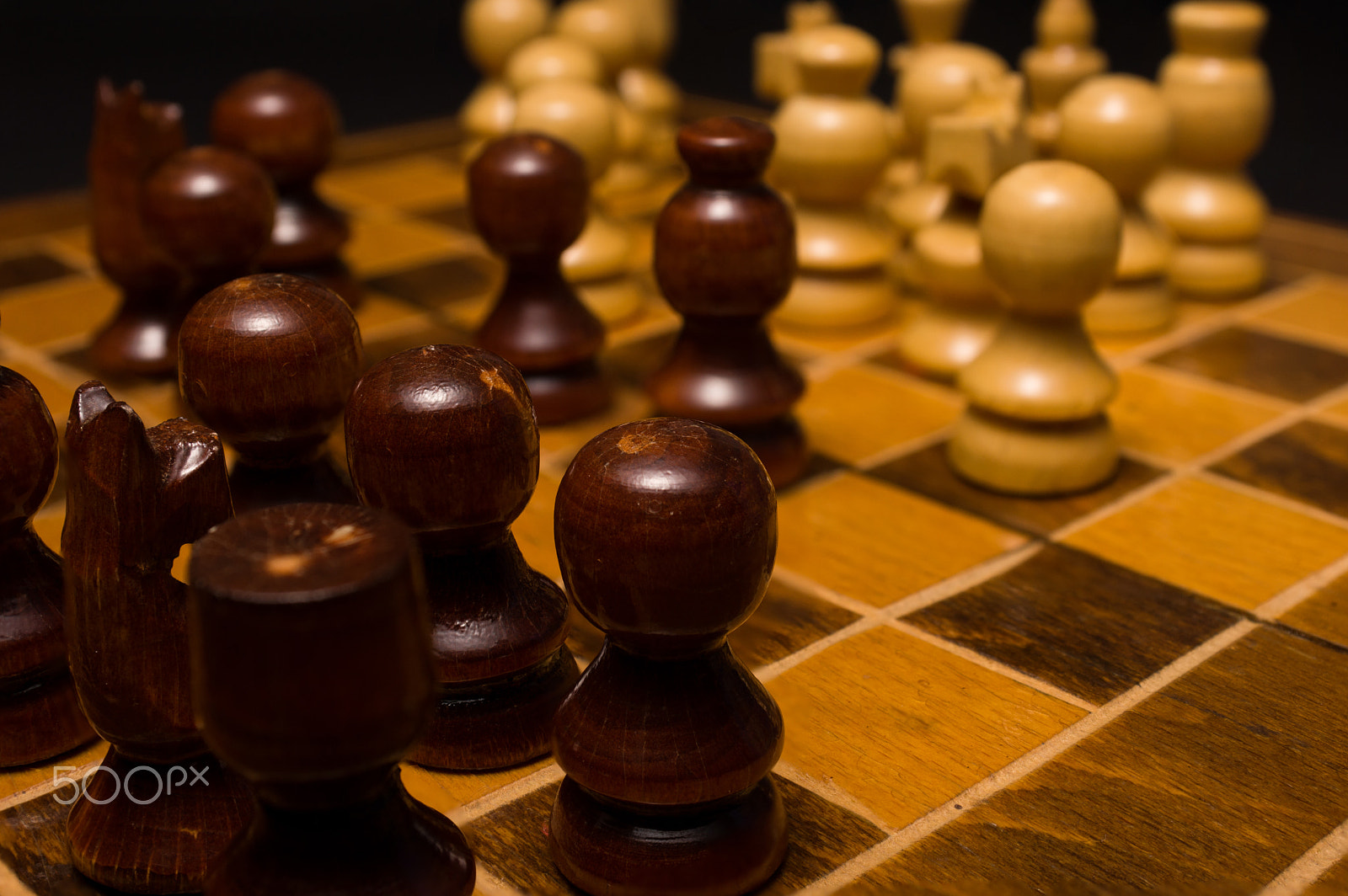 Sony SLT-A77 + Minolta AF 28-85mm F3.5-4.5 sample photo. Light and dark wooden chess pieces on chess table. photography
