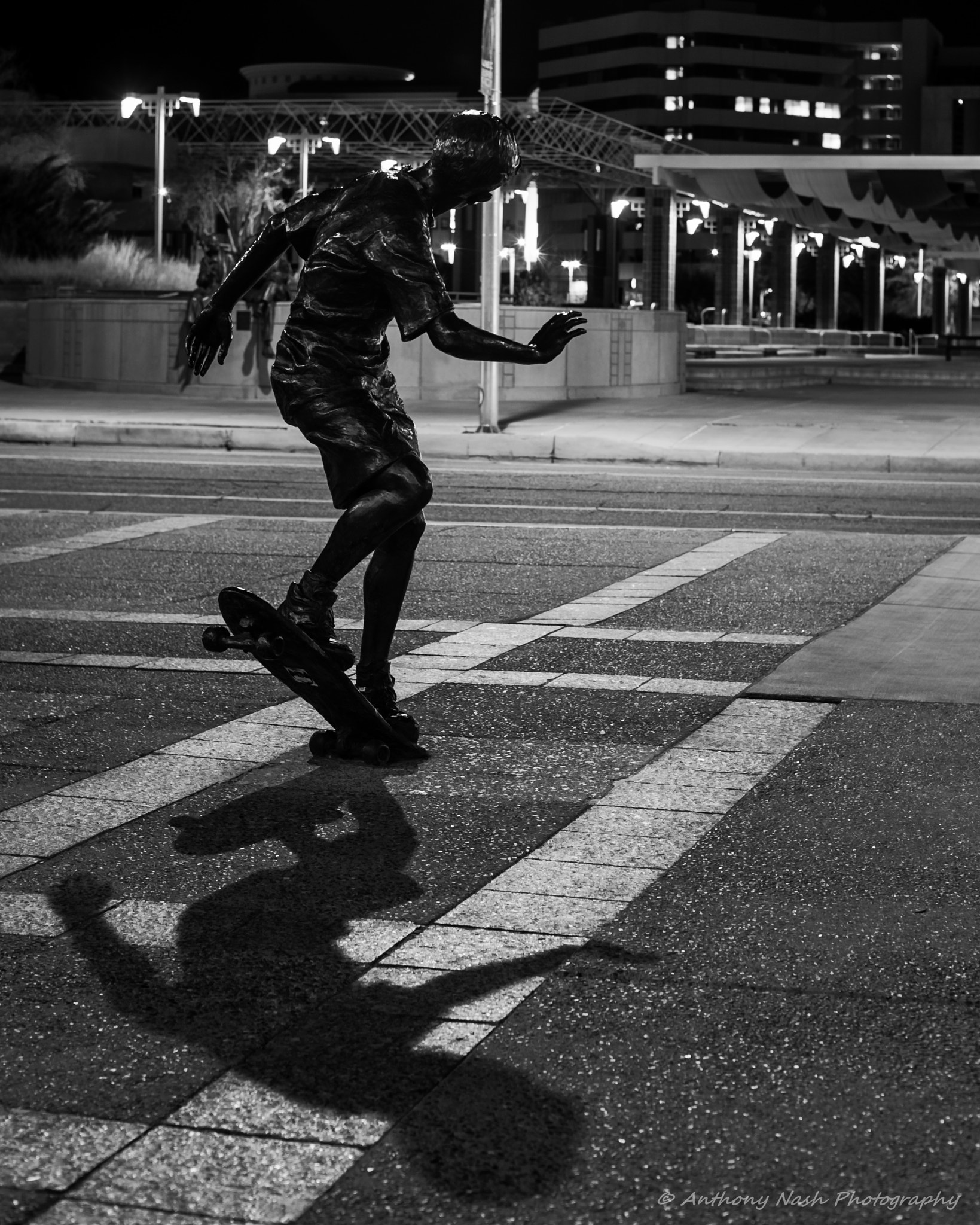 Nikon D3 + AF Nikkor 50mm f/1.4 sample photo. The bronze skater photography