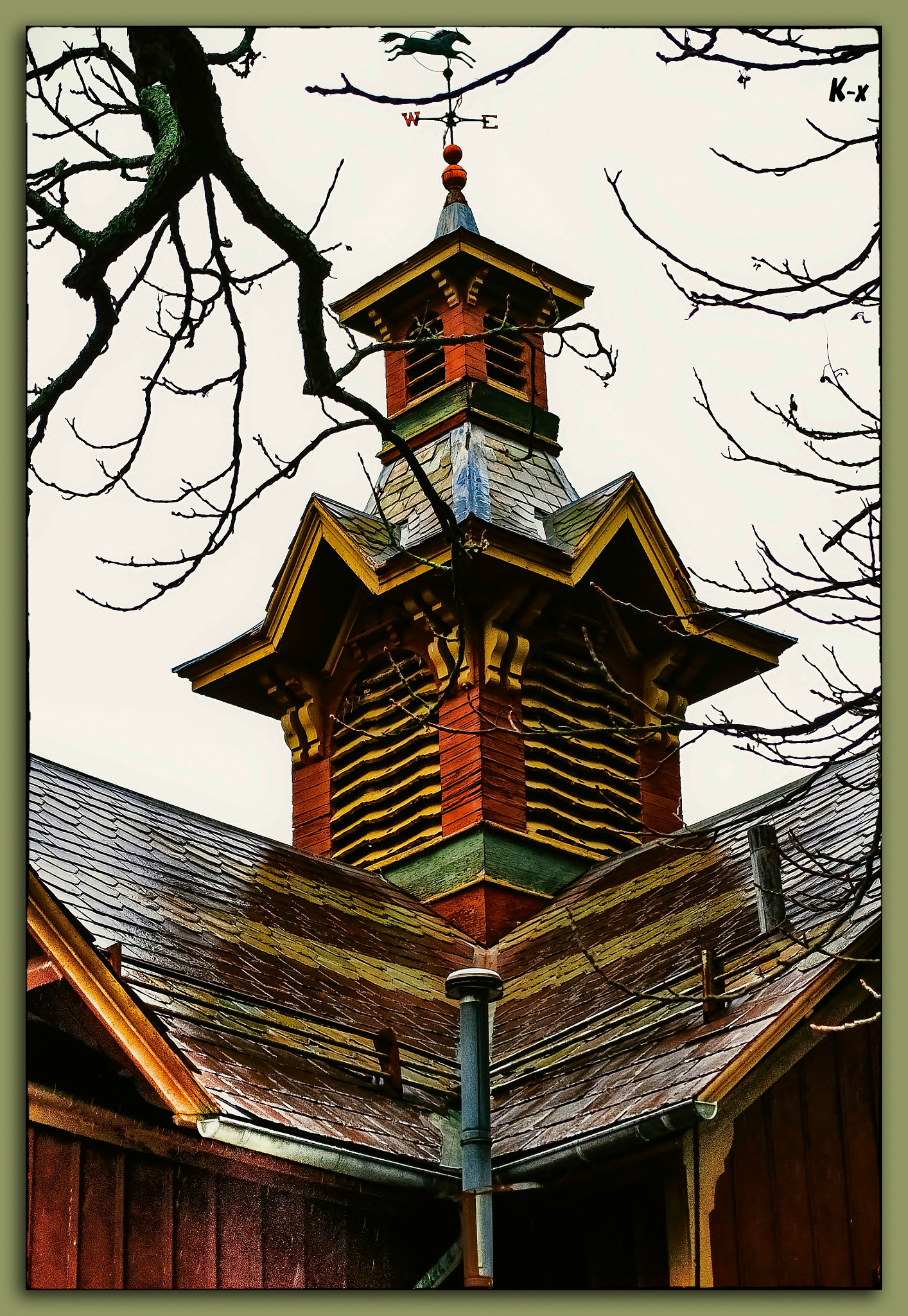 Pentax K-x sample photo. Tree branches in front of miller barn on olive st. photography