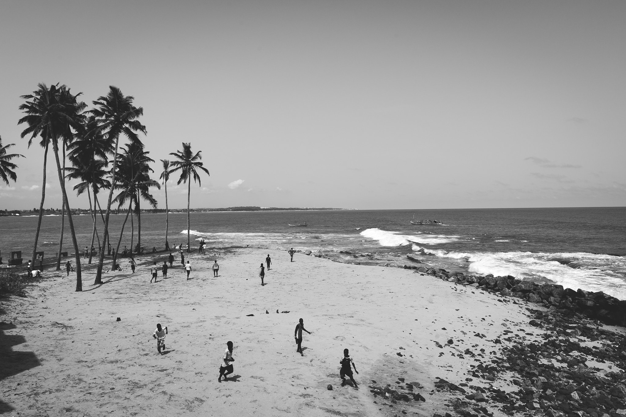 Canon EF 24mm F1.4L II USM sample photo. Kids playing soccer on the beach photography
