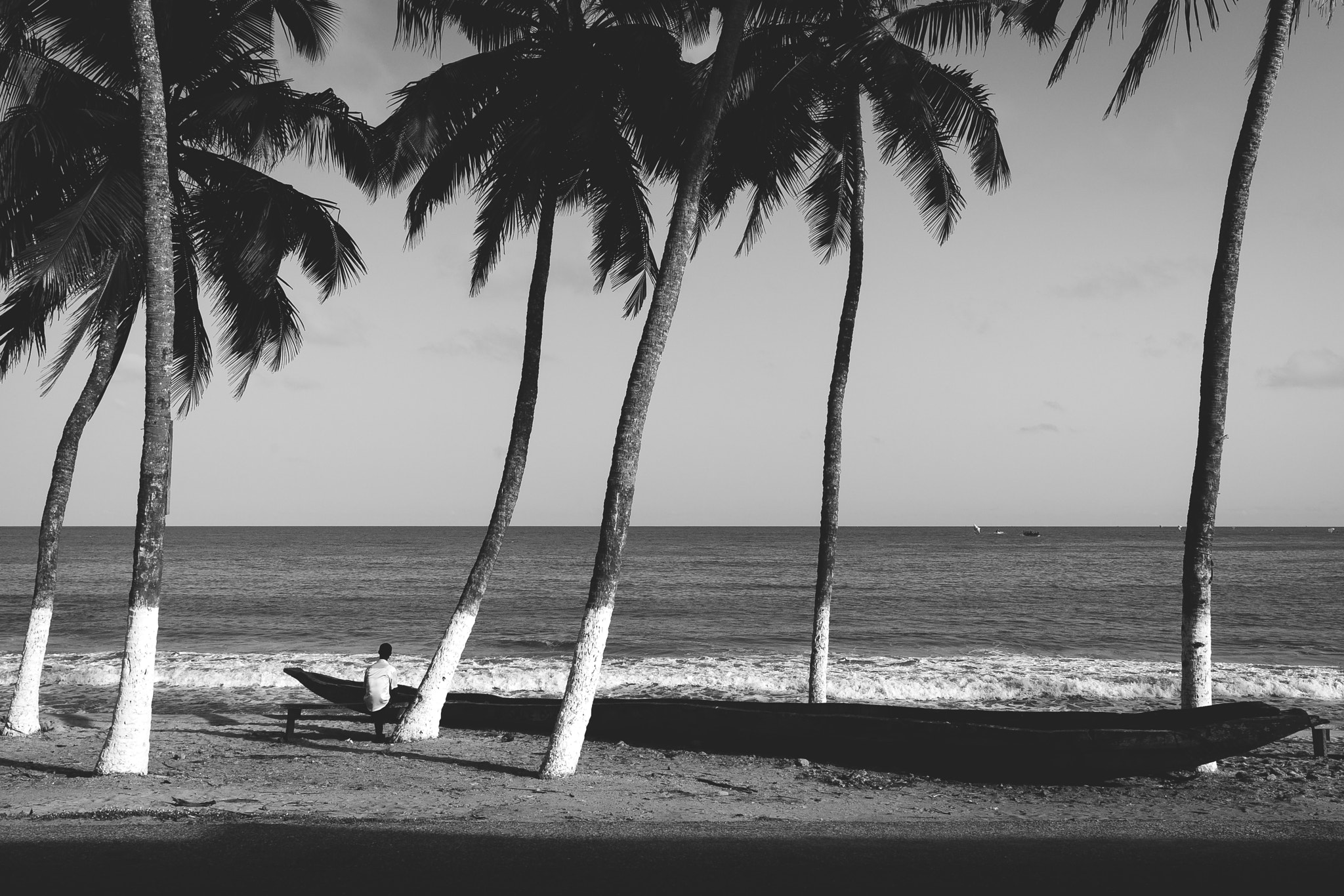 Canon EF 24mm F1.4L II USM sample photo. Man waiting by his boat photography
