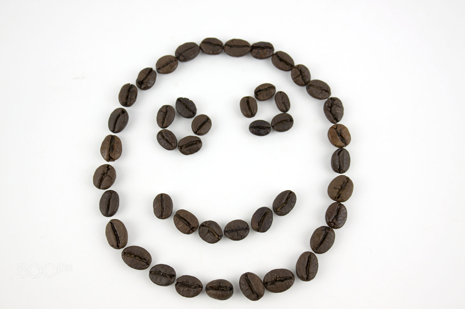 Canon EF-S 18-55mm F3.5-5.6 III sample photo. Smiley face made of coffee beans photography