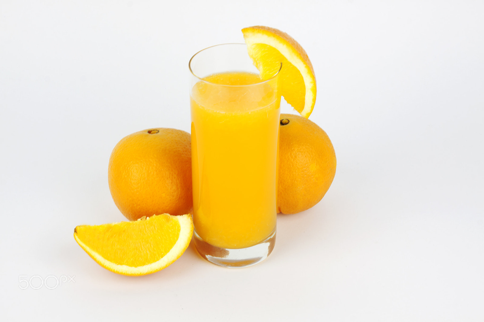 Canon EF-S 18-55mm F3.5-5.6 III sample photo. Natural orange juice and oranges whole and sliced photography