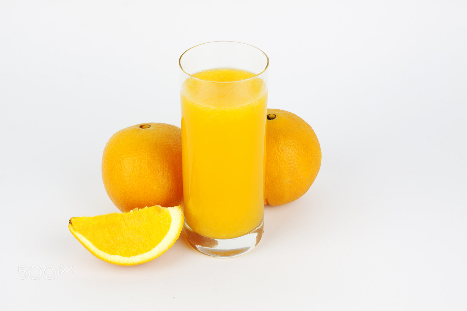 Canon EF-S 18-55mm F3.5-5.6 III sample photo. Natural orange juice and oranges whole and sliced photography