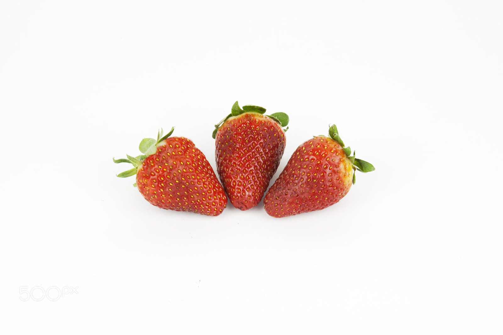 Canon EF-S 18-55mm F3.5-5.6 III sample photo. Strawberries isolated on white photography