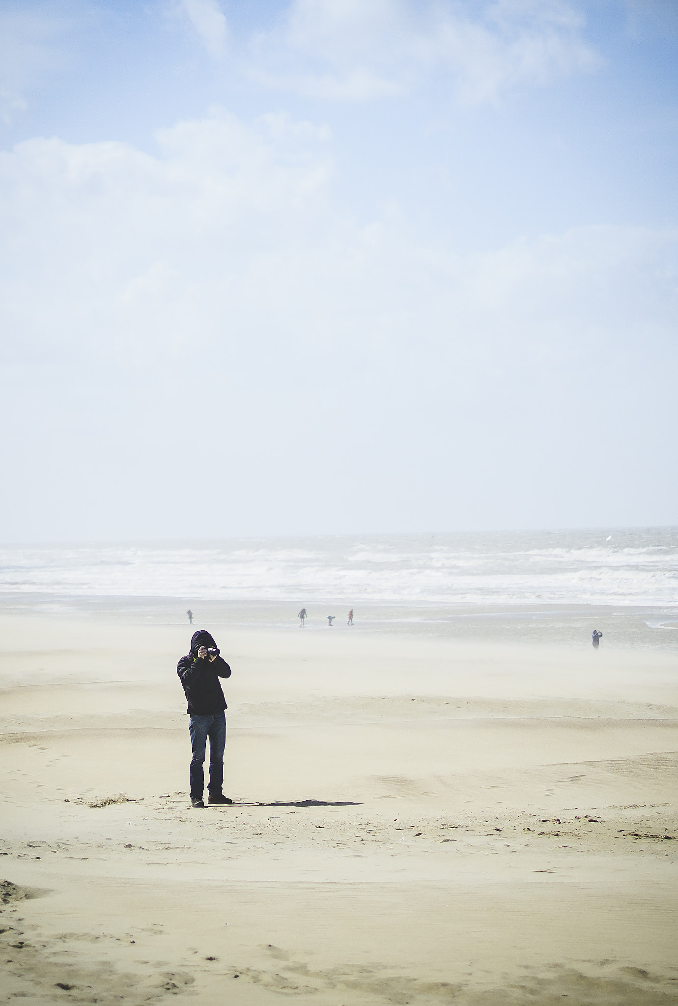 Sony ILCA-77M2 + Sony 50mm F1.4 sample photo. Man on the beach photography