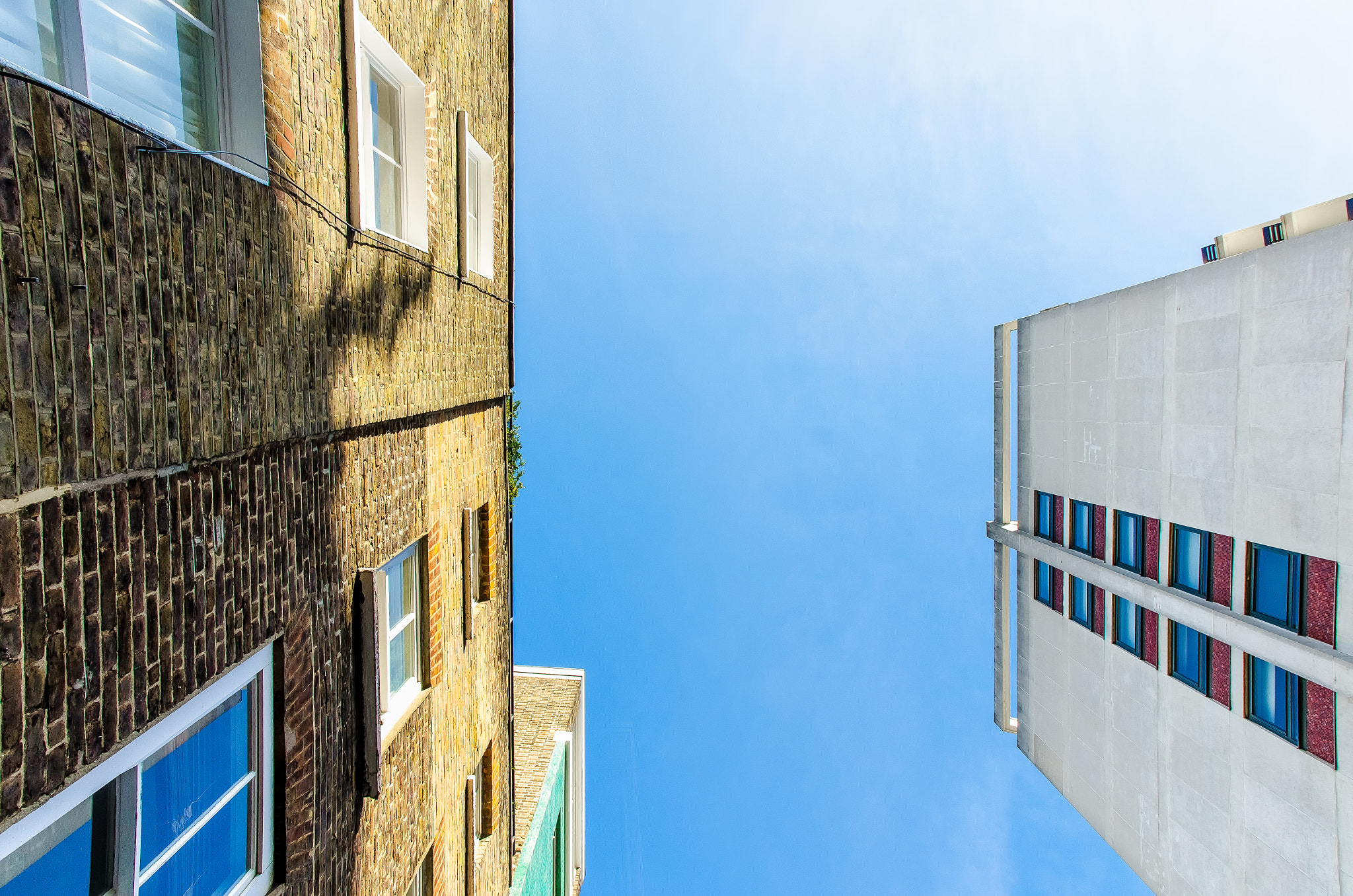 Sigma 17-70mm F2.8-4 DC Macro OS HSM | C sample photo. Looking up a street in london photography