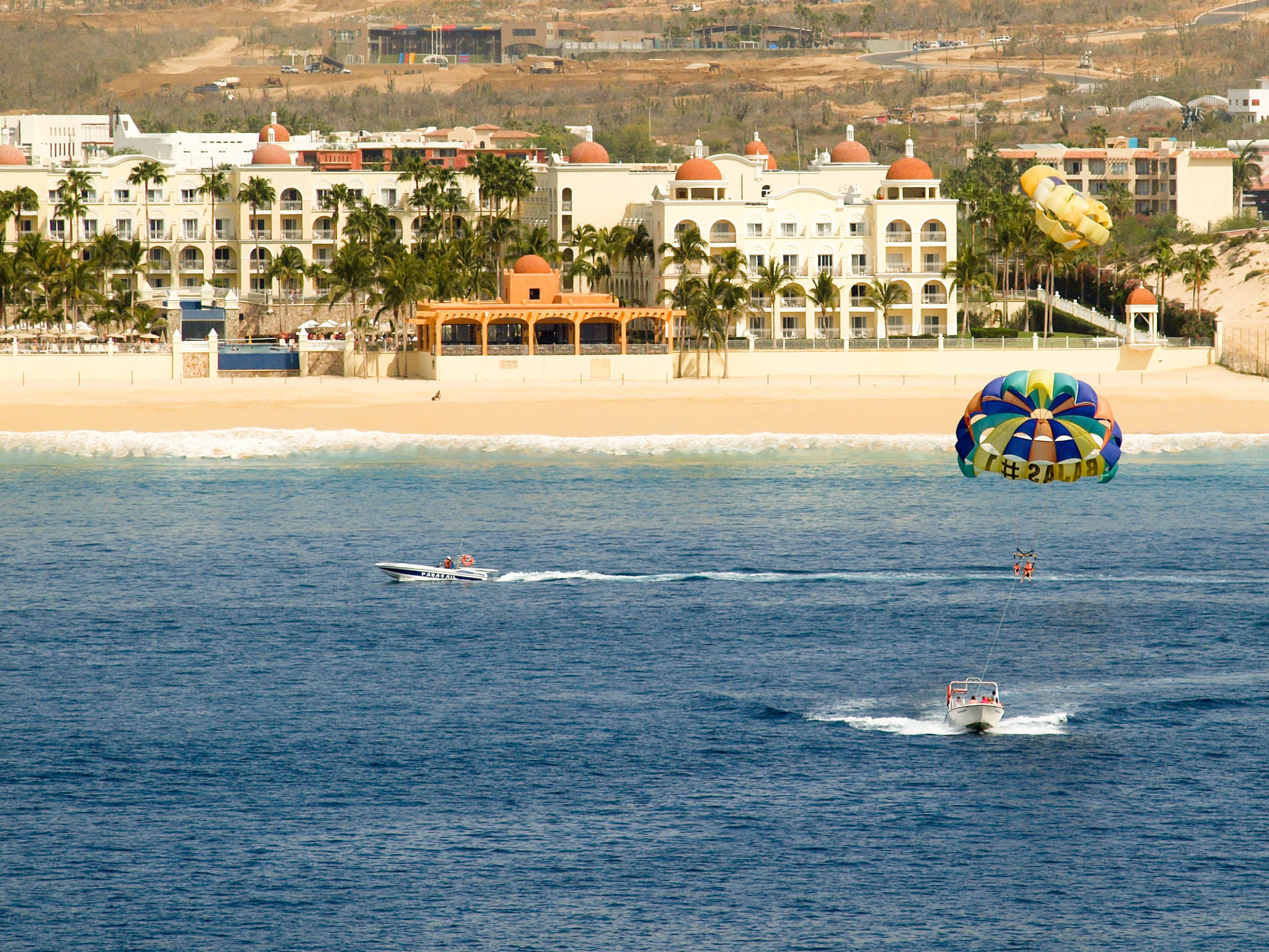 Olympus Zuiko Digital ED 40-150mm F4.0-5.6 sample photo. Parasailing in paradise photography