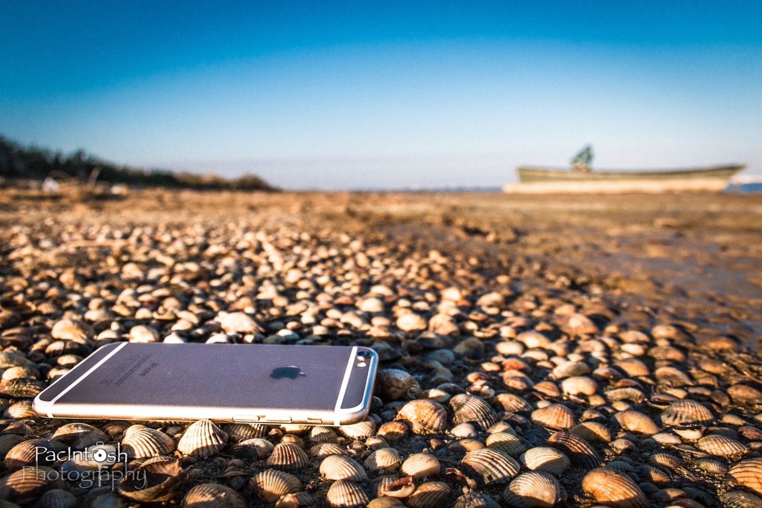 Canon EF-S 18-55mm F3.5-5.6 sample photo. Iphone on the beach photography