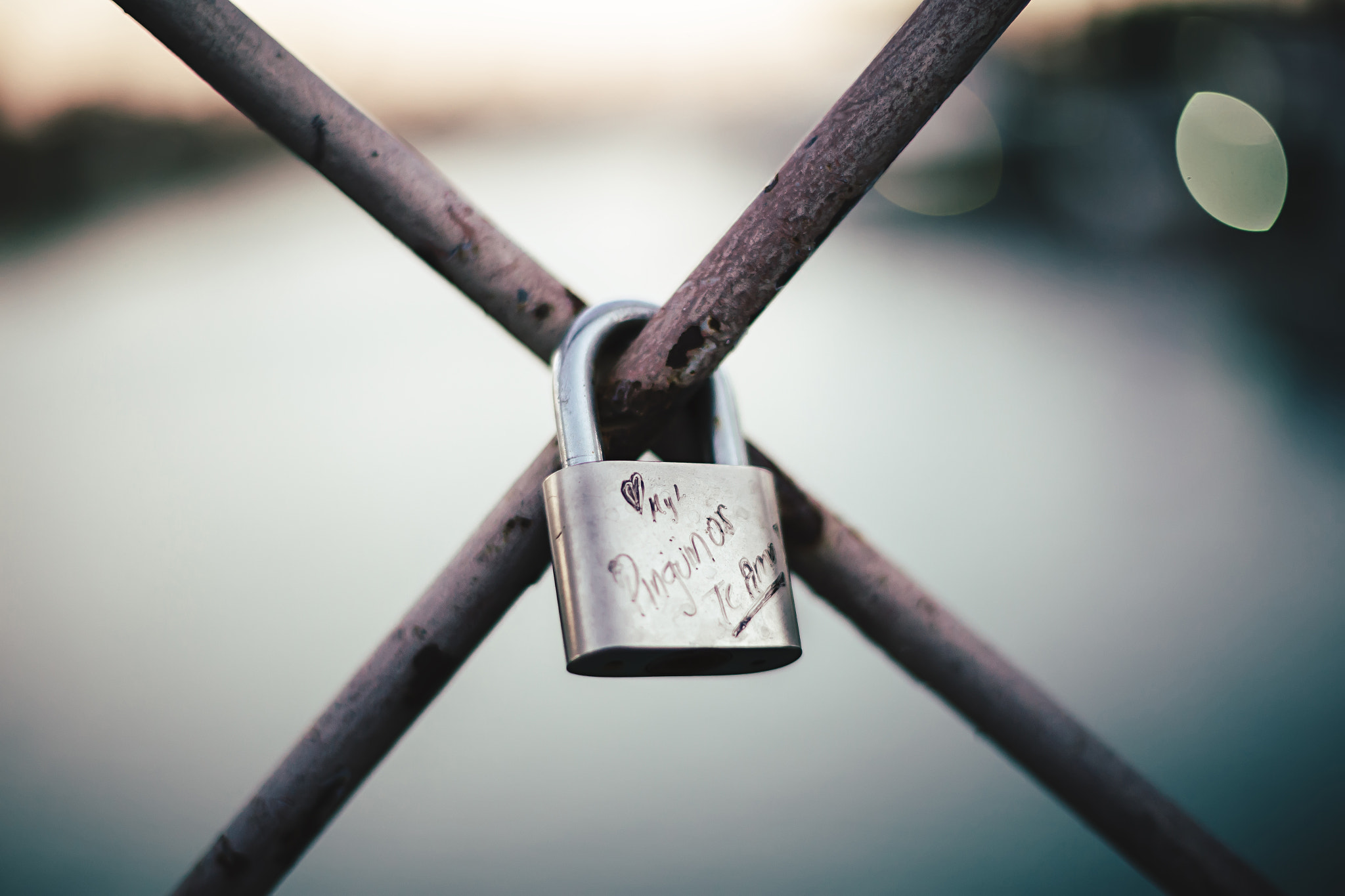 Love lock on the San Telmo Bridge in Sevilla, Spain