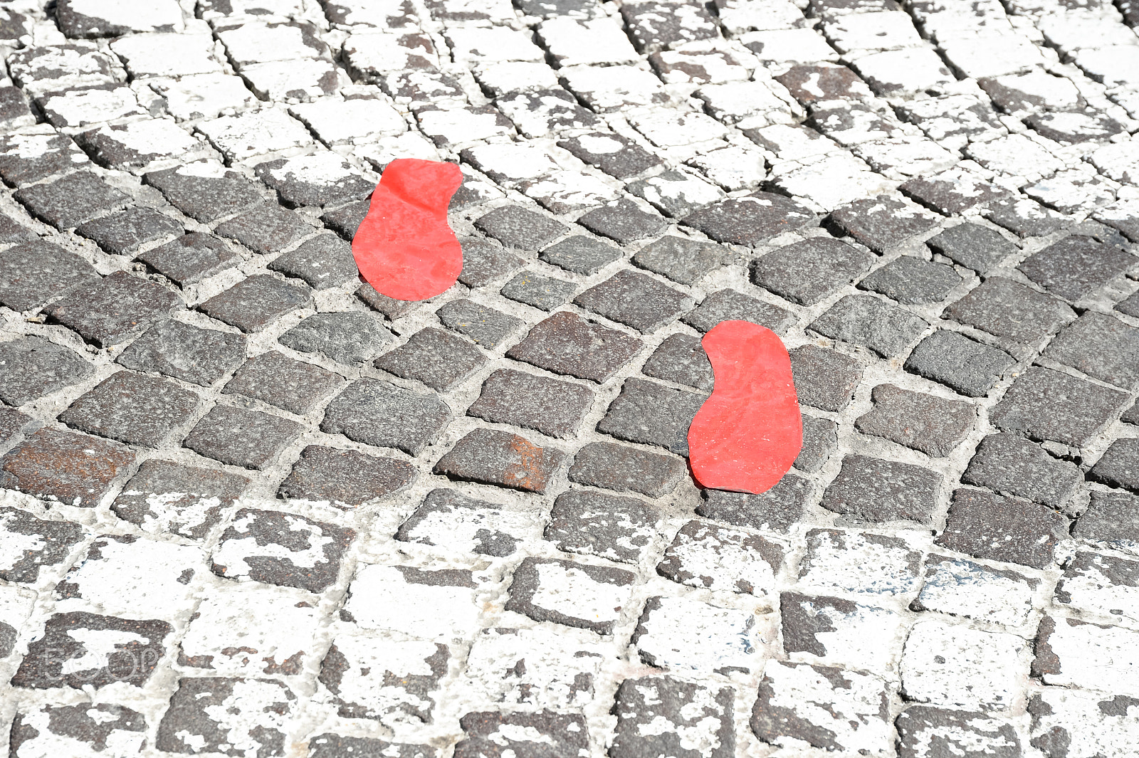 Nikon Df + Sigma 24-105mm F4 DG OS HSM Art sample photo. Red footsteps in town photography