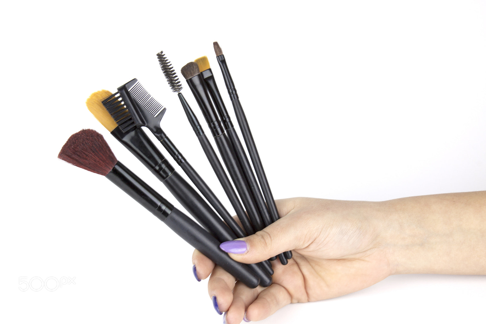 Canon EF-S 18-55mm F3.5-5.6 III sample photo. Hand holding makeup brush photography