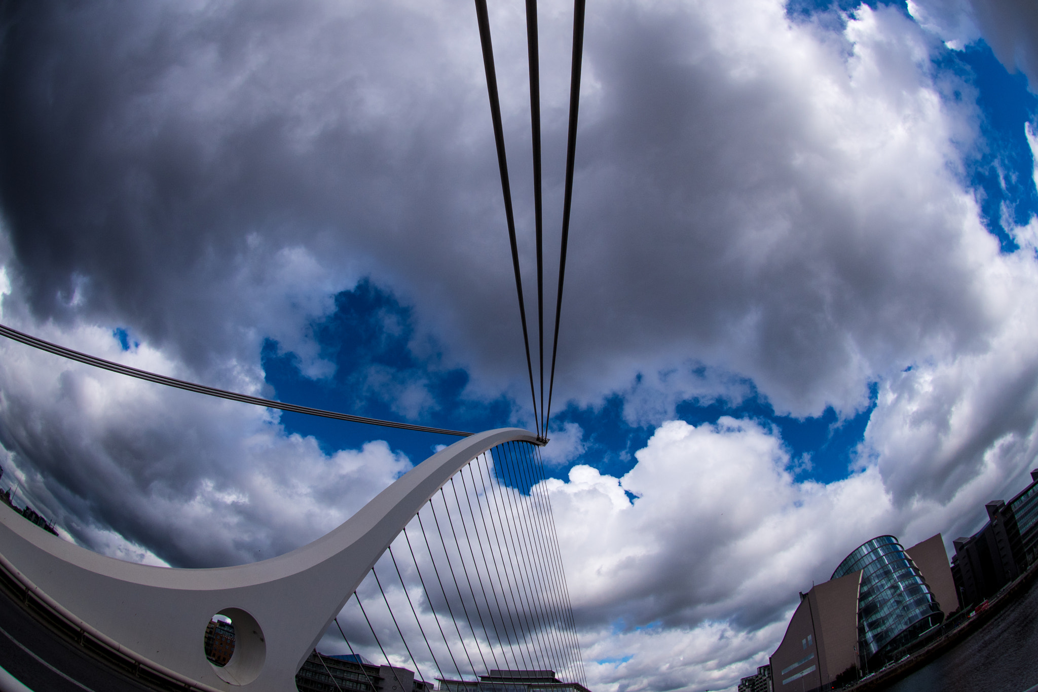 Nikon AF DX Fisheye-Nikkor 10.5mm F2.8G ED sample photo. Views of the samuel beckett bridge in the evening photography