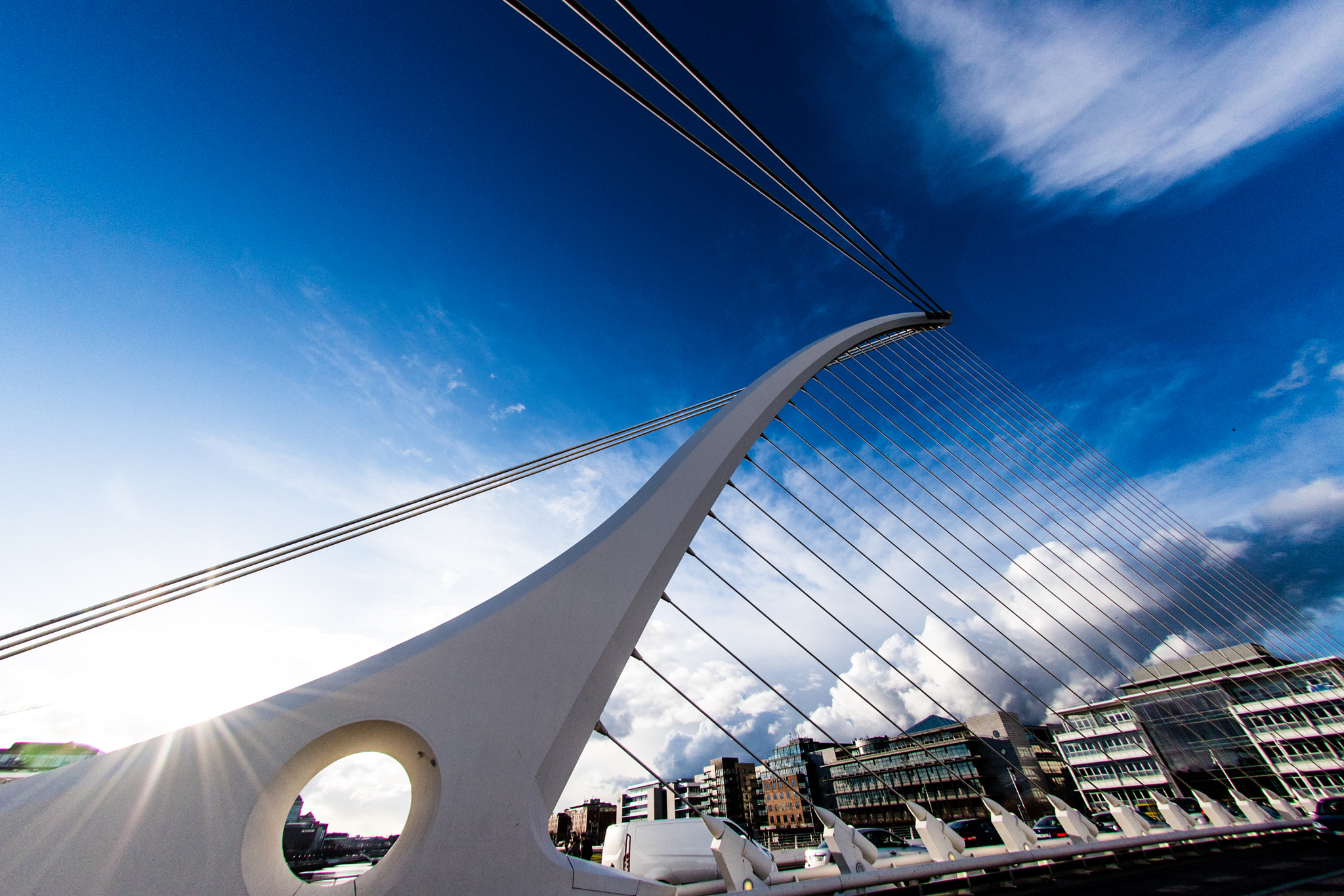 Nikon AF DX Fisheye-Nikkor 10.5mm F2.8G ED sample photo. Views of the samuel beckett bridge in the evening photography