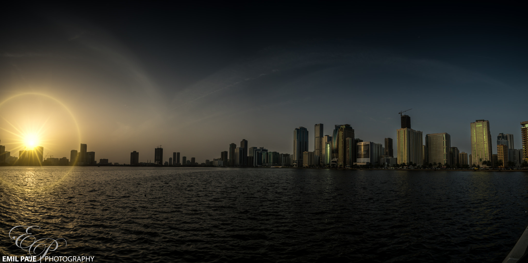 Sony a7R II + Canon EF 17-40mm F4L USM sample photo. Panorama-starflare at sunrise in the city photography