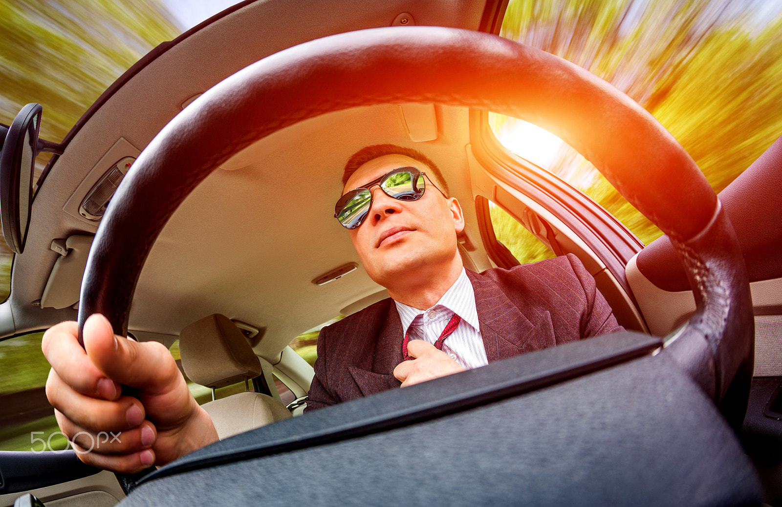 Canon EF 15mm F2.8 Fisheye sample photo. Man driving a car. photography